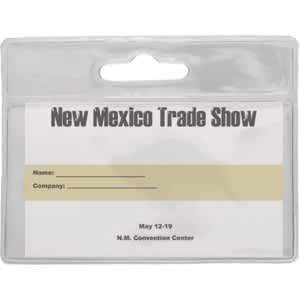 A clear plastic badge holder with a top slot for attachment and space for a name and company details.