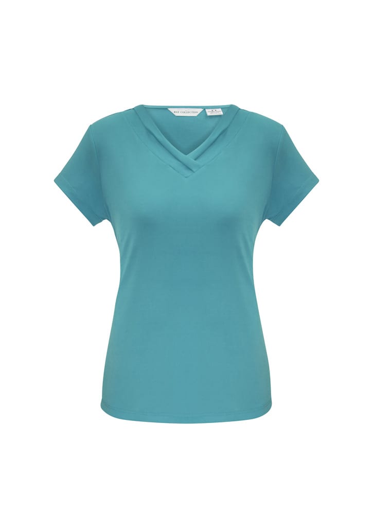 A teal women's short sleeve top with a v-neck design and a logo on the label.