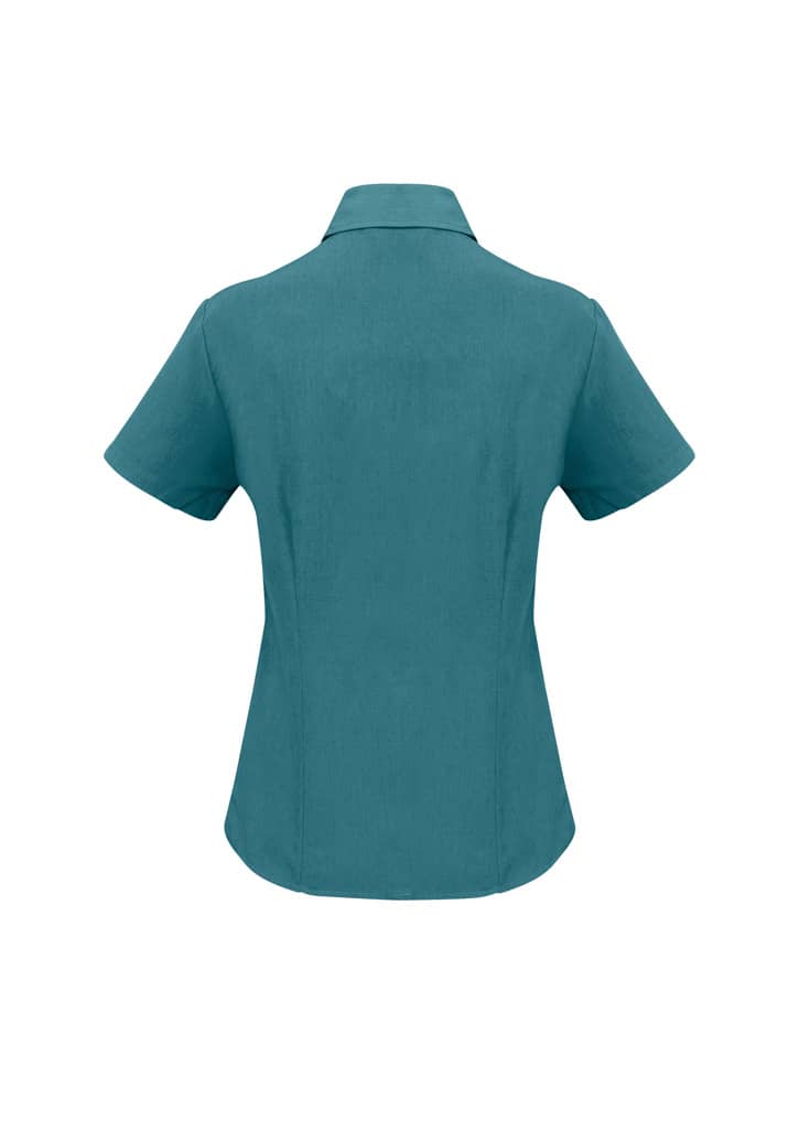 A plain short sleeve button-up shirt in teal, featuring a collared neck and a logo on the back.