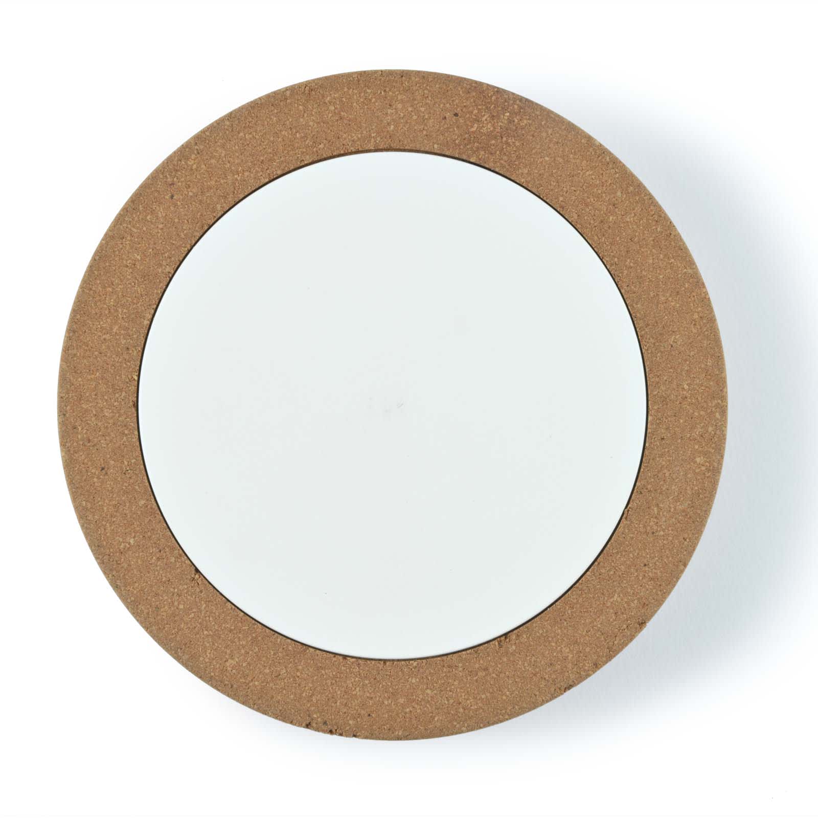 A wireless charger with a round cork exterior and a smooth white charging surface.