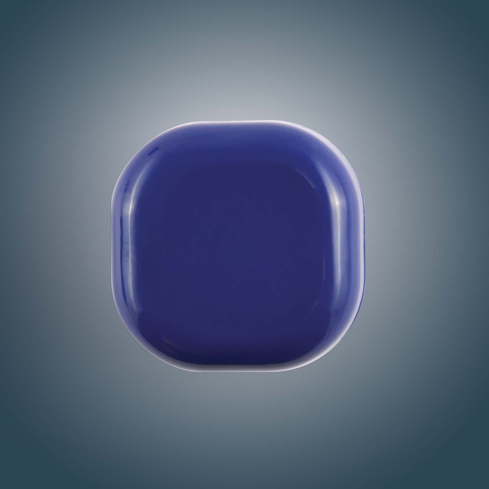 A cube-shaped lip balm in a rich purple hue, featuring a smooth, glossy surface.
