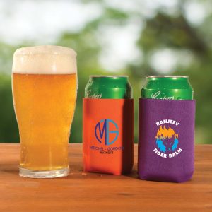 A drink cooler in orange and purple holds cans, with a beer glass nearby. Both coolers feature different logos.