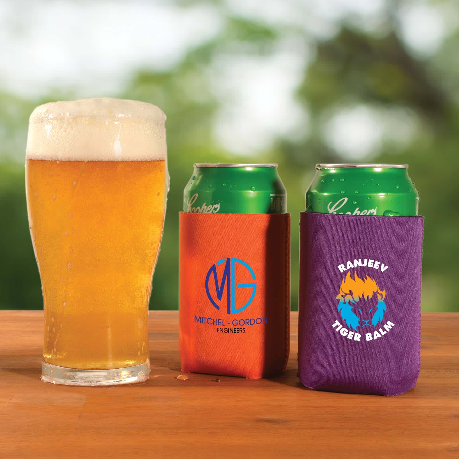 A drink cooler in orange and purple holds cans, with a beer glass nearby. Both coolers feature different logos.