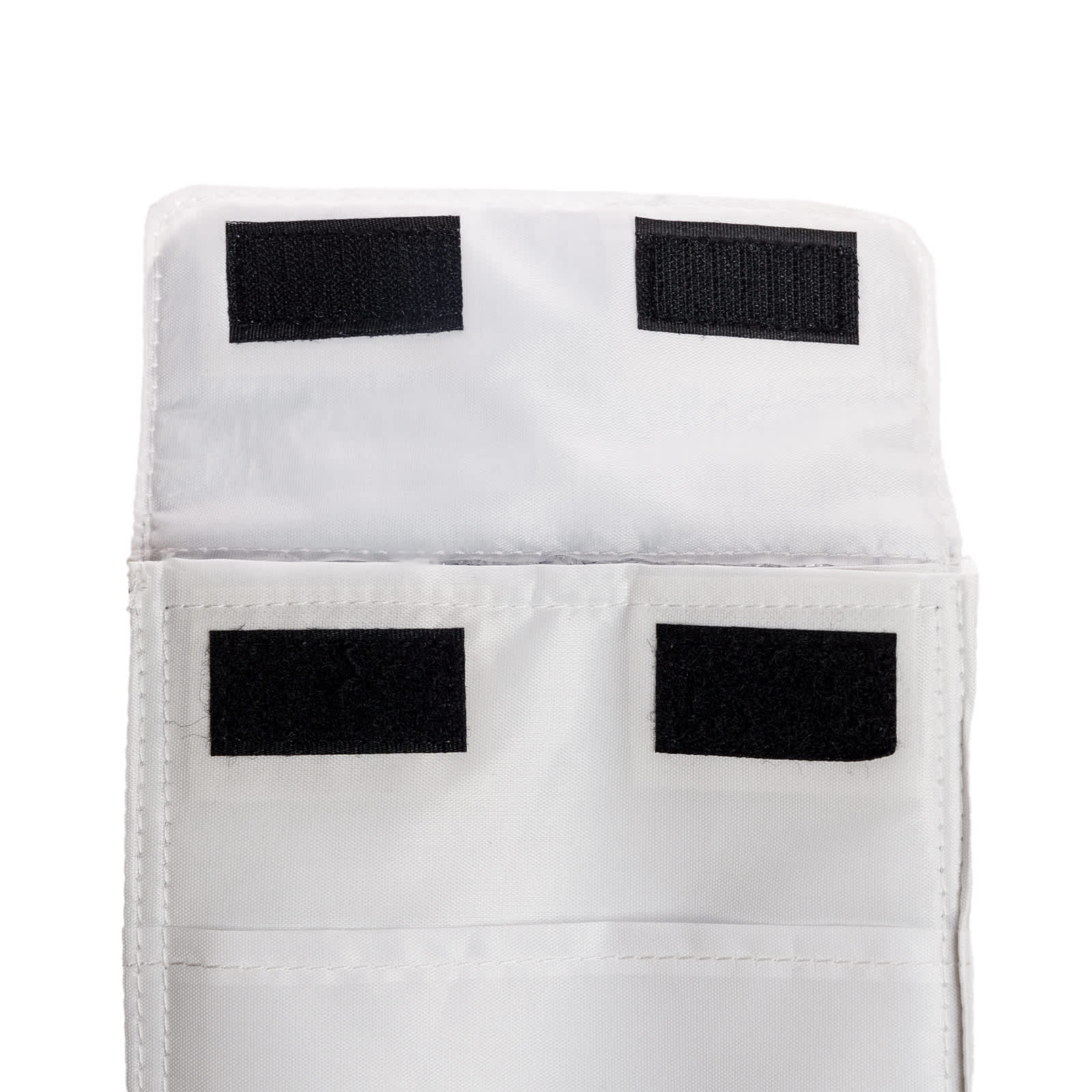 A white cooler lunch bag featuring a hook-and-loop closure at the top and a spacious compartment for food storage.