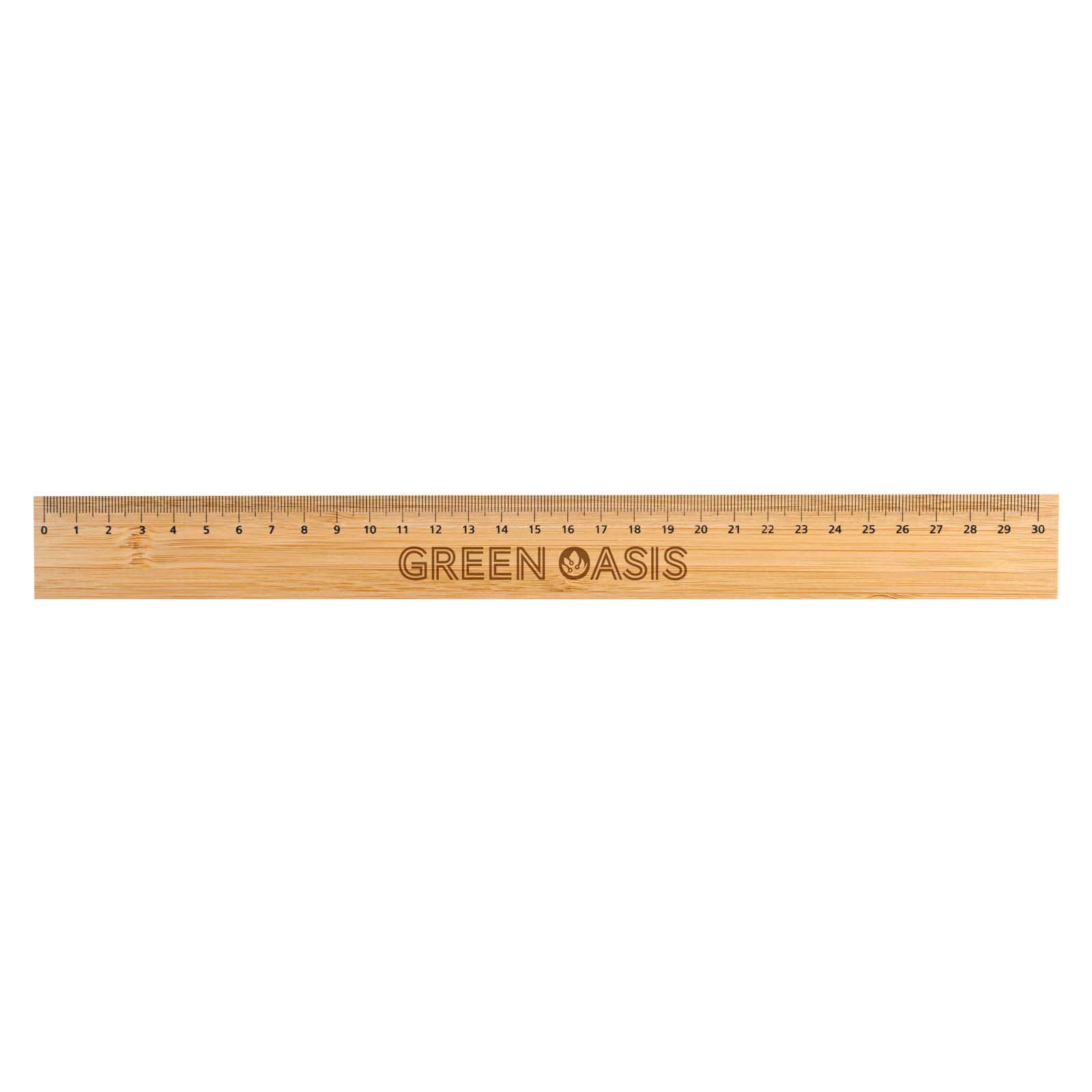 A Bamboo 30cm ruler featuring measurements along one edge and the engraved text 