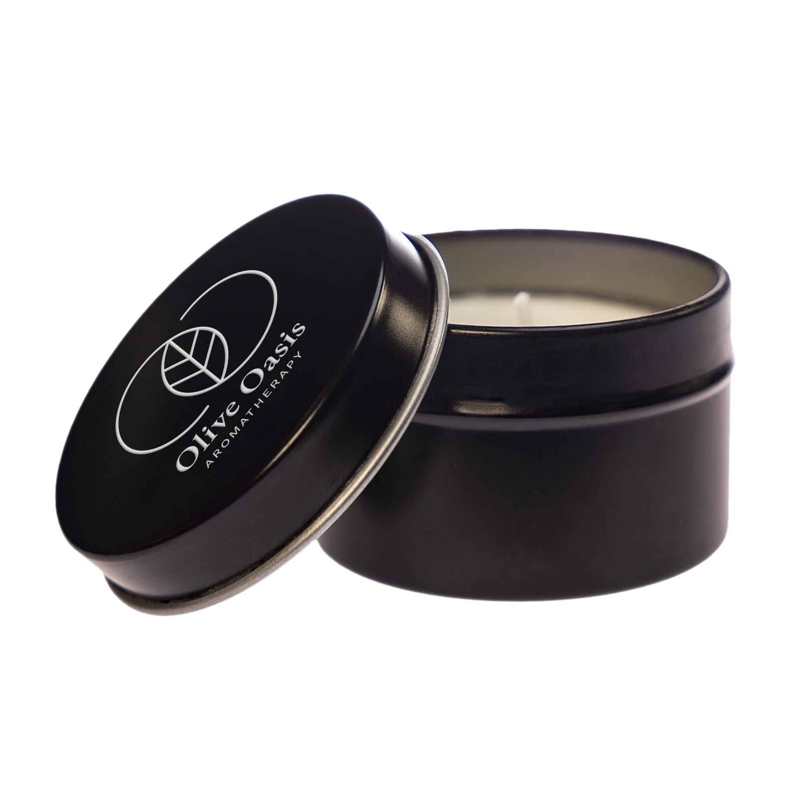 A black tin candle with an open lid, featuring a decorative label that includes stars and a crescent moon design.