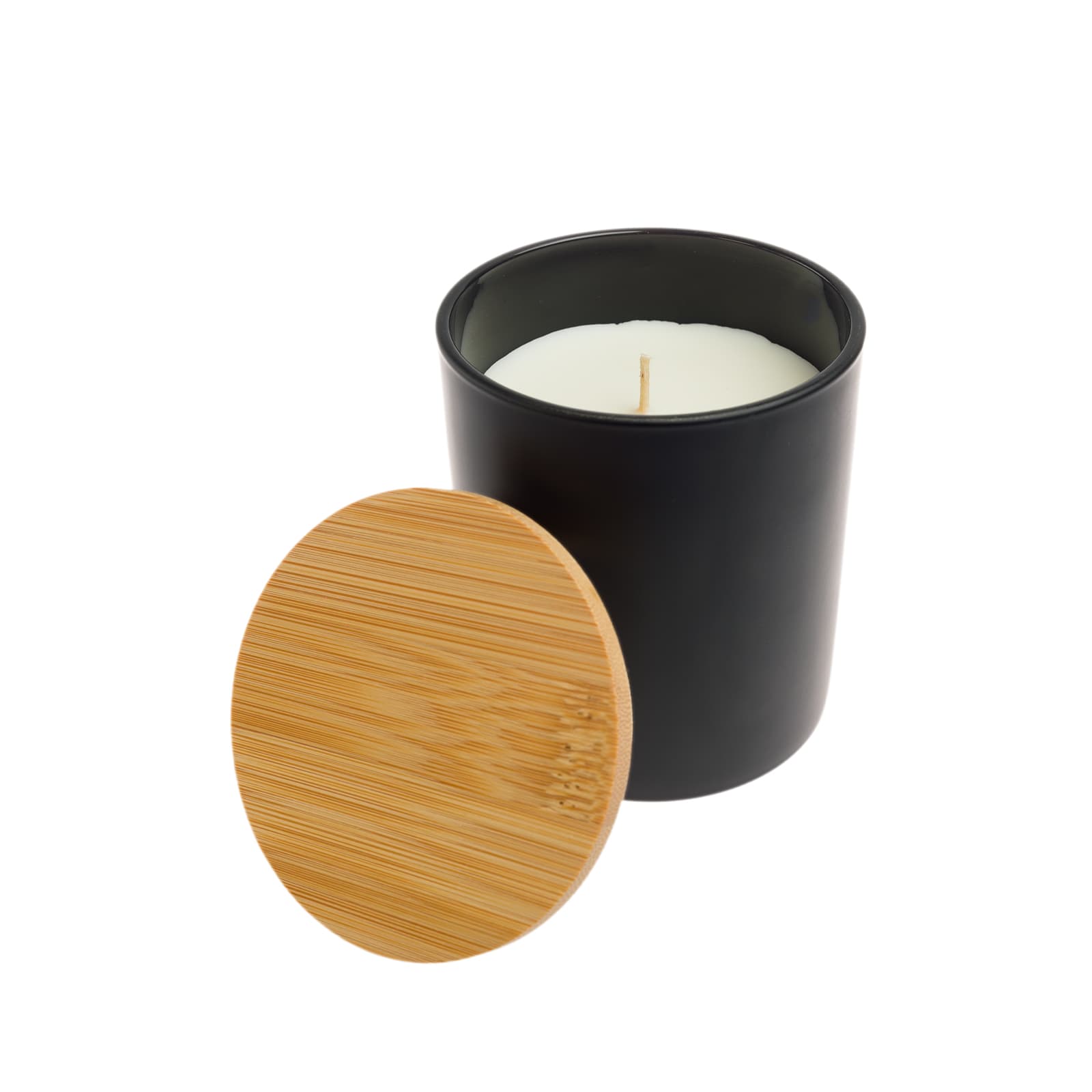 A medium-sized glass candle with a smooth, white wax surface and a single wick at the center.