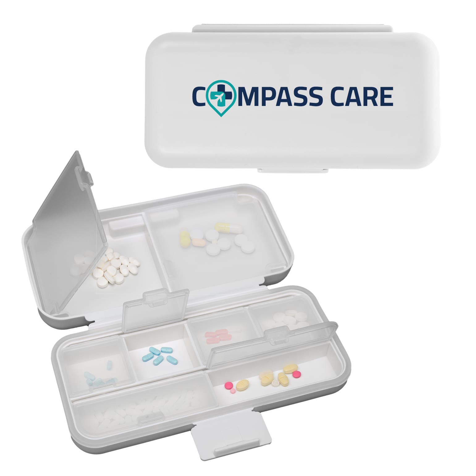 A white compact pill organizer with multiple compartments and a transparent lid, featuring a logo on top.