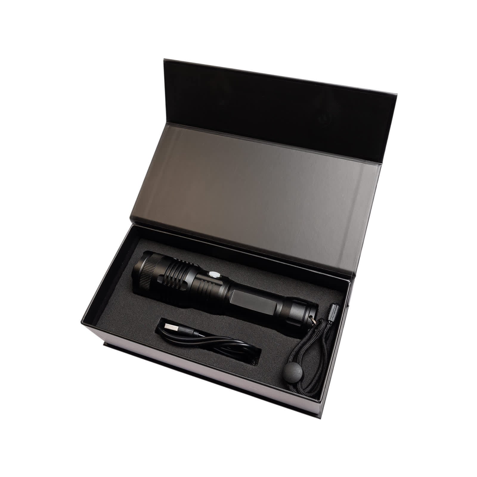 A rechargeable black torch displayed in a black gift box, accompanied by a charging cable and wrist strap.