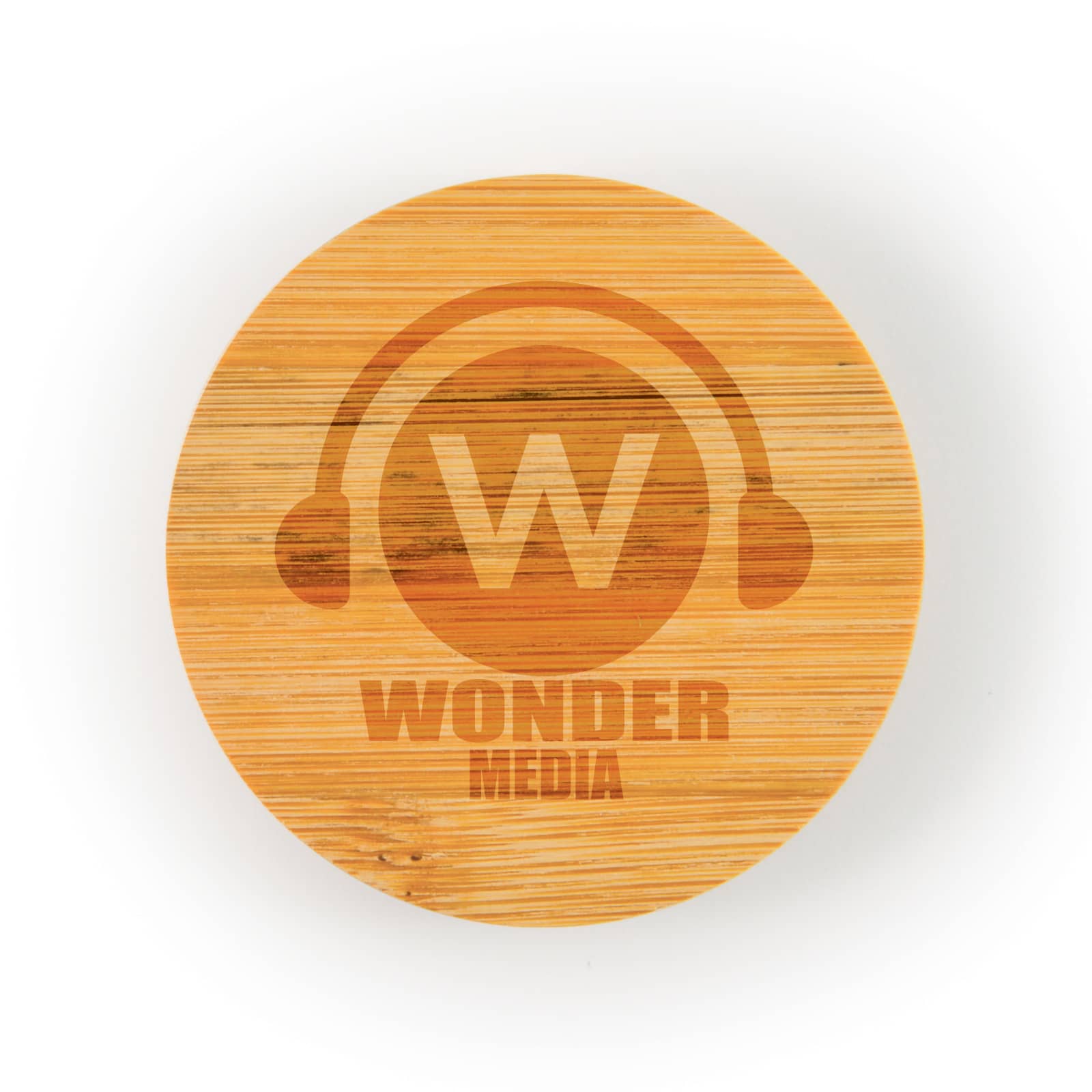 A round bamboo coaster features an engraved logo with the text 