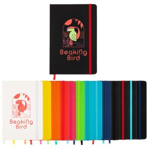 A collection of colourful A5 notebooks in various shades, featuring a logo on one. Colours include orange, purple, and blue.