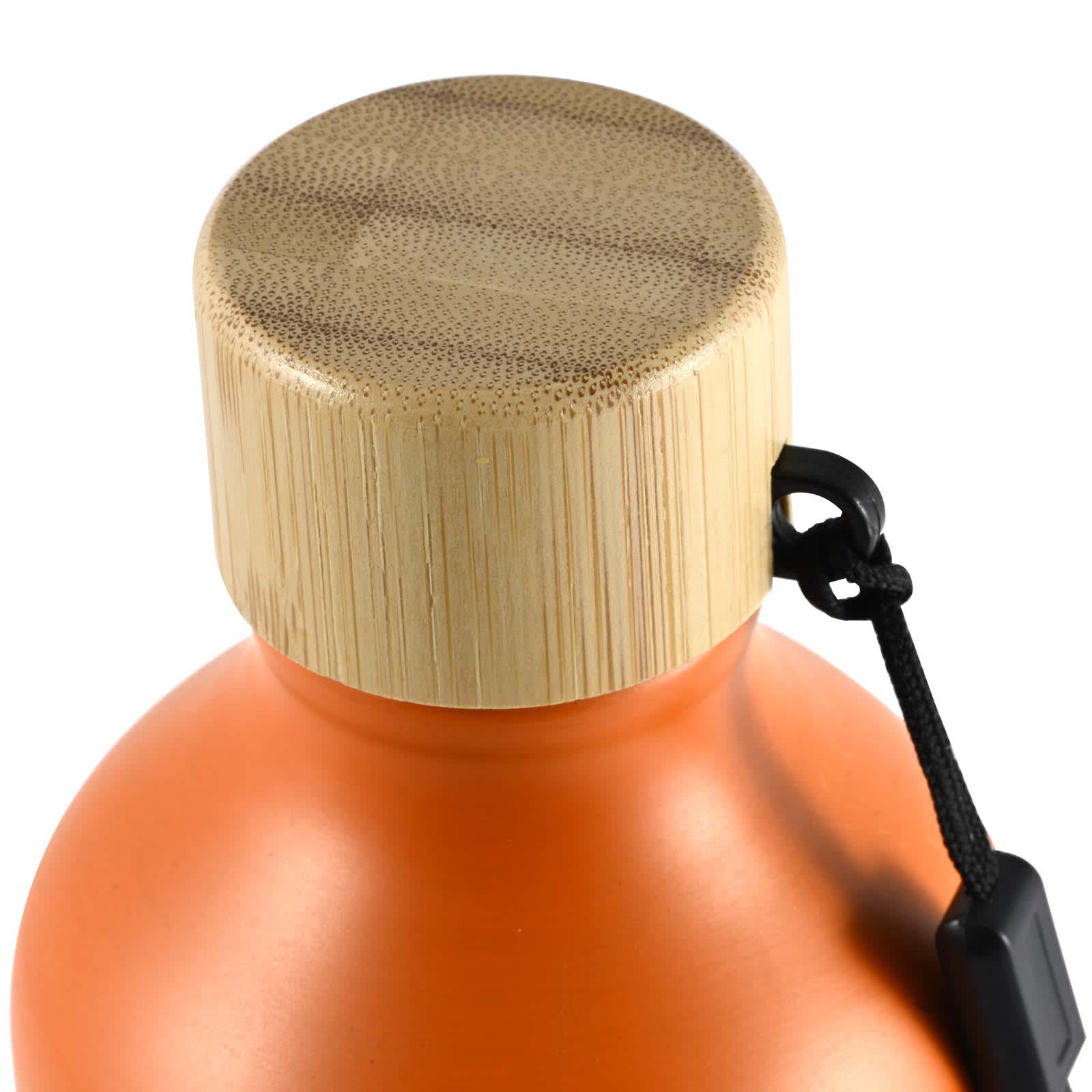 A drink bottle in vibrant orange with a bamboo lid and a black wrist strap. It features a logo.