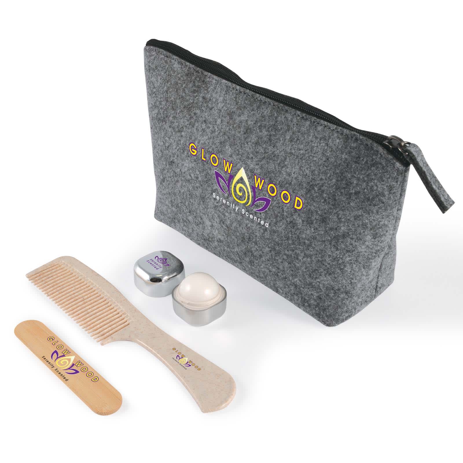 A grey cosmetic bag with a zipper, containing a wooden comb and two small containers. The bag features a logo.