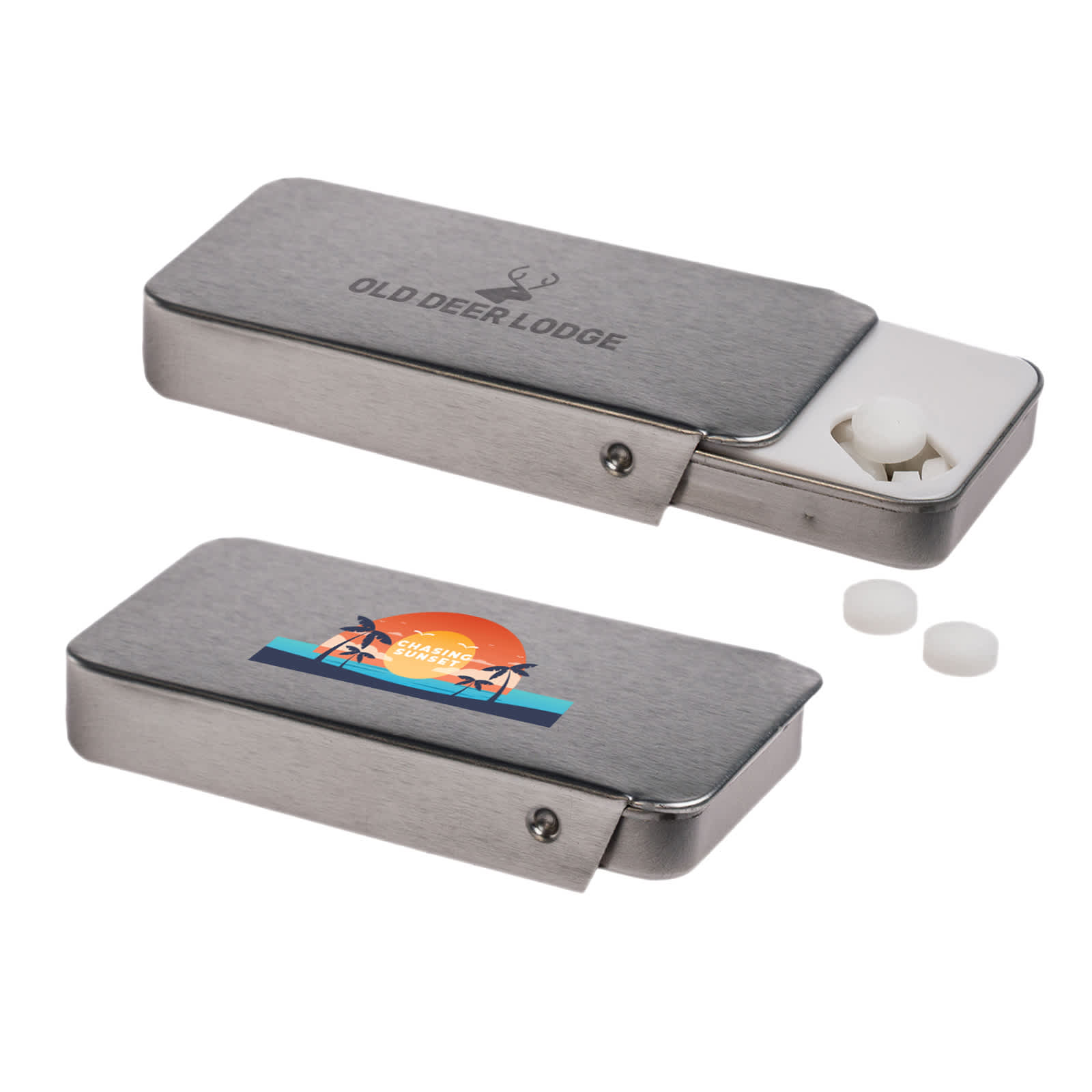 A silver slider tin containing sugar-free breath mints, with white mints visible beside it. The tin features a decorative logo.