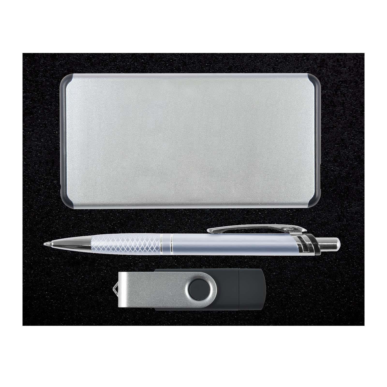 A sleek silver gift box containing a pen, a USB drive, and a business card holder.