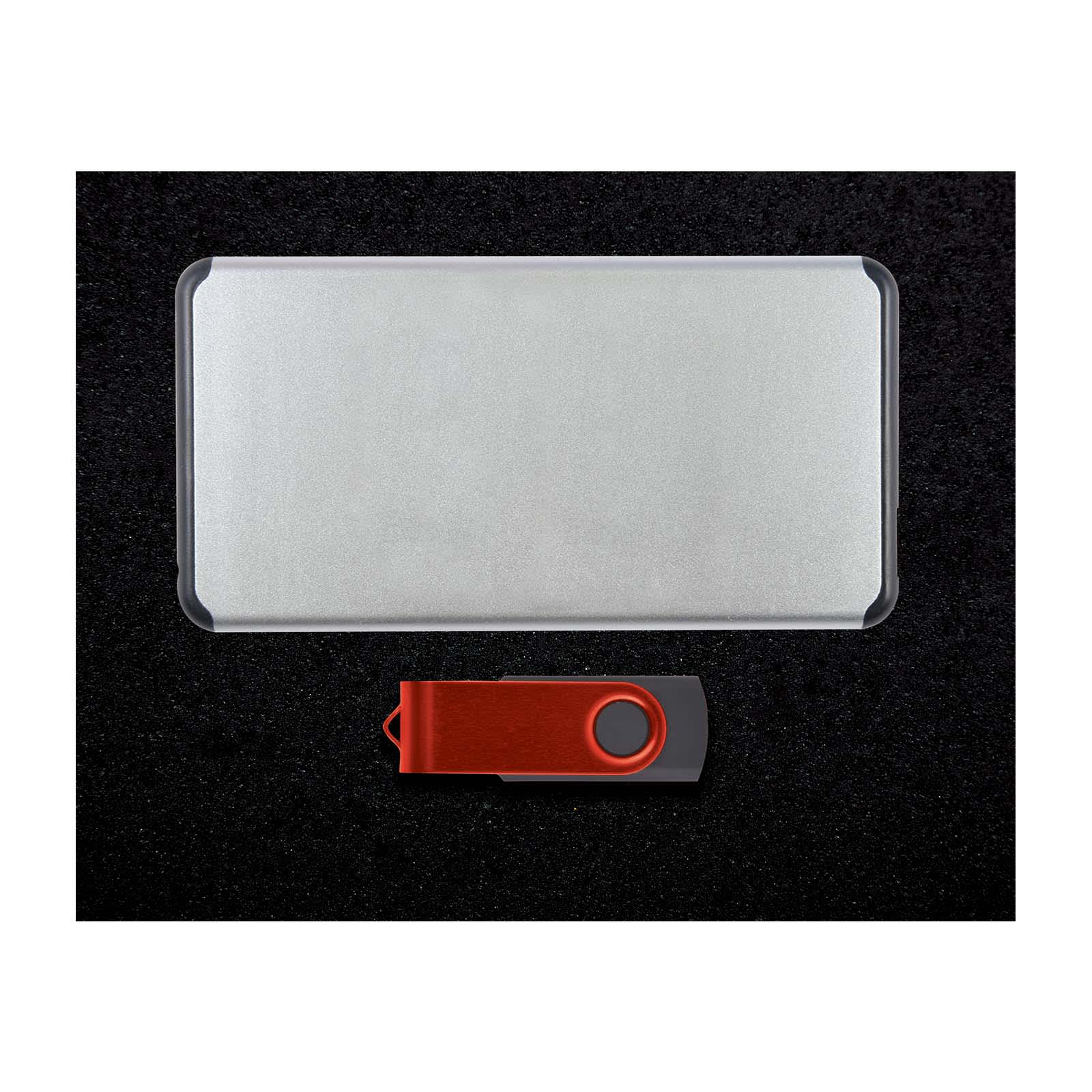 A power bank with a sleek aluminum design and a red USB drive are displayed in the image, part of the Jewel Gift Set.
