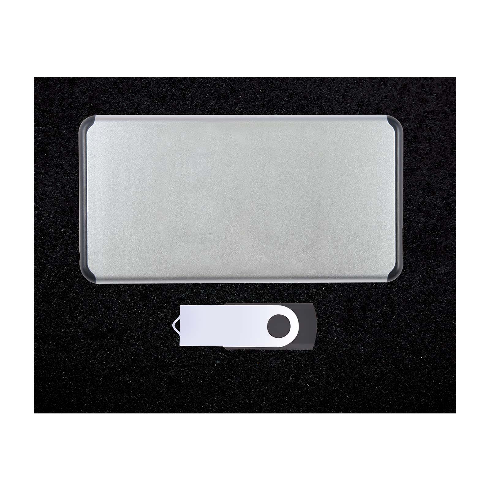 A silver power bank and a white USB flash drive, both featured on a black background.