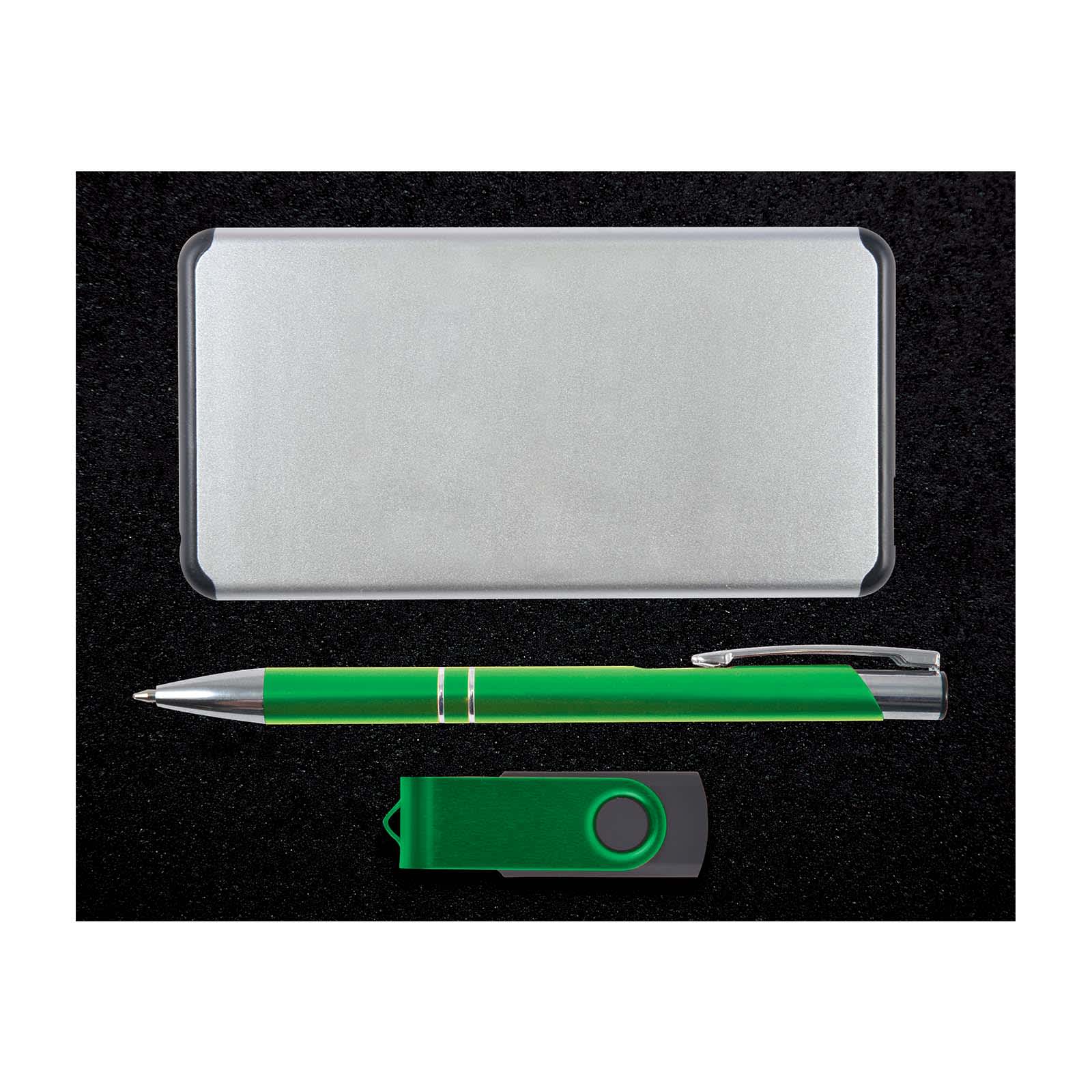 A green pen, green USB drive, and silver business card case arranged on a black surface.