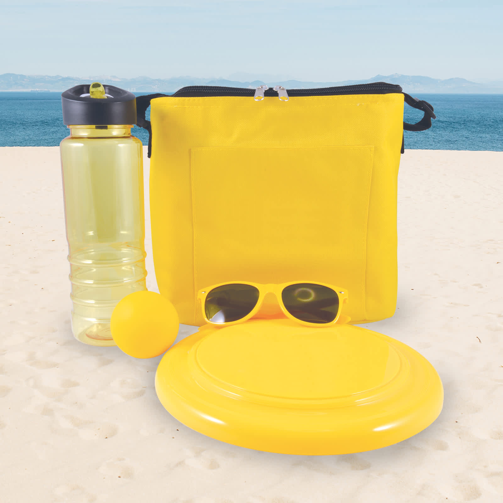 A drink bottle, a frisbee, a yellow ball, and a pair of sunglasses are arranged alongside a bright yellow cooler bag.
