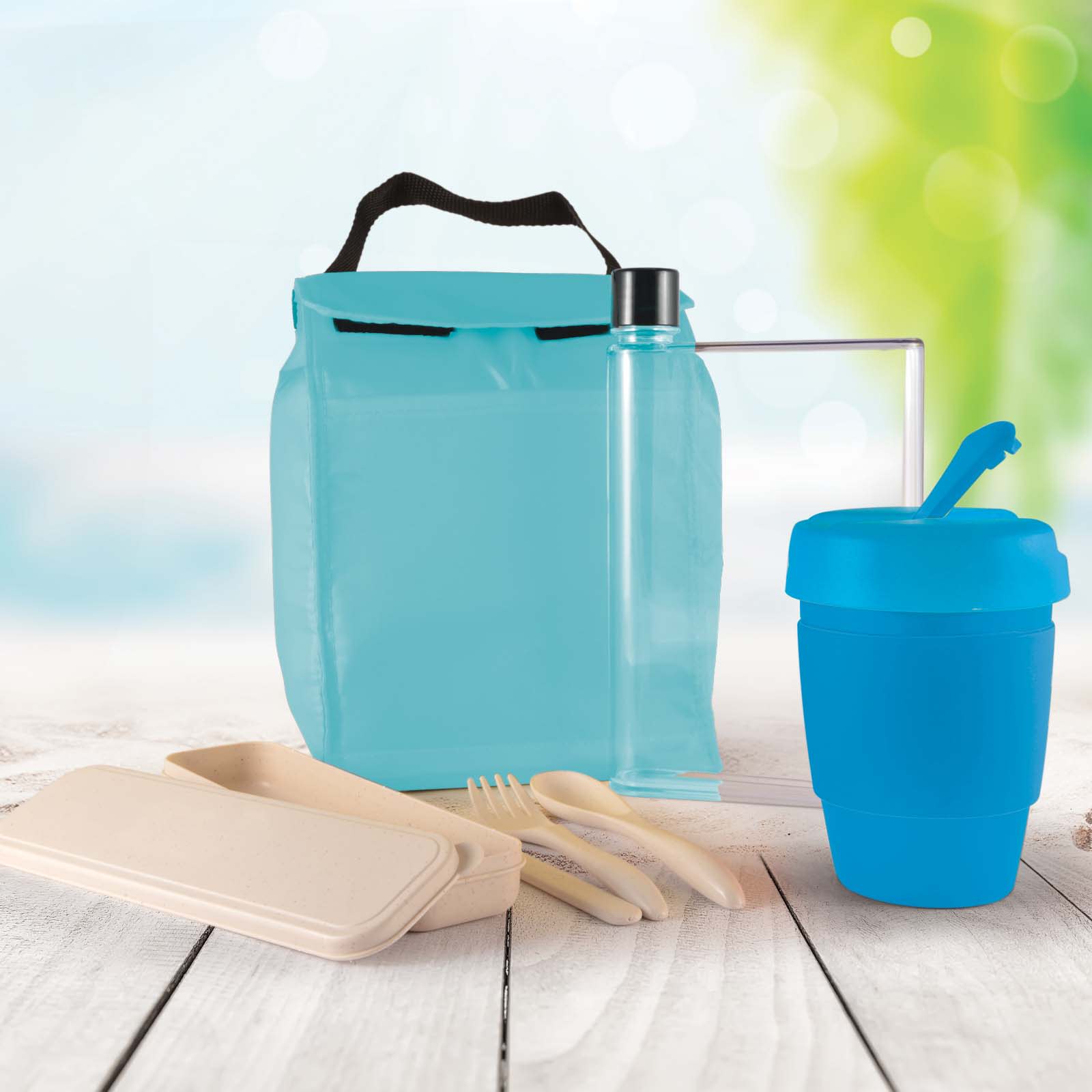 A turquoise picnic pack including a drink bottle, food containers, cutlery, and a cup, all with a modern design.