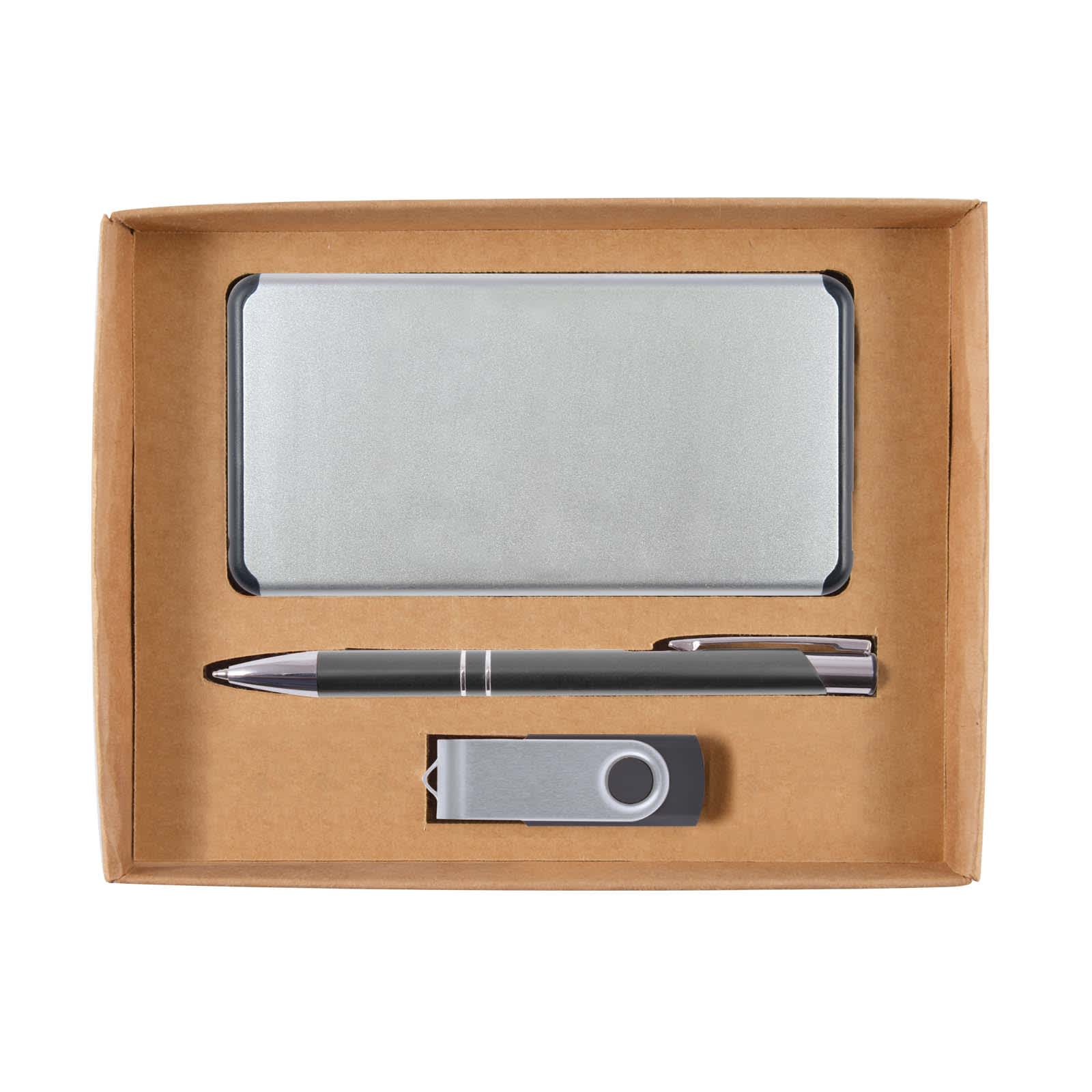 A gift set featuring a silver power bank, a silver pen, and a grey USB drive, all in a cardboard box.