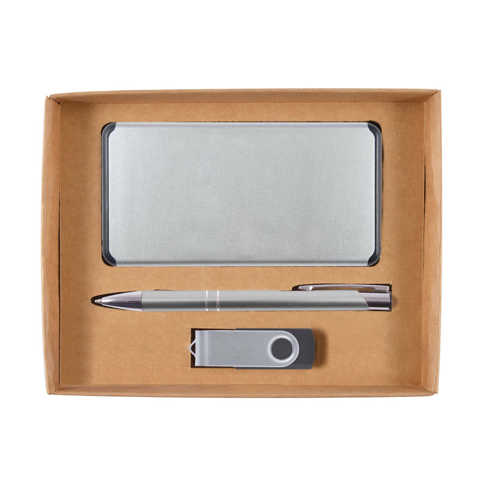A silver power bank, silver pen, and silver USB stick in a cardboard gift set. The set is neatly arranged in a box.