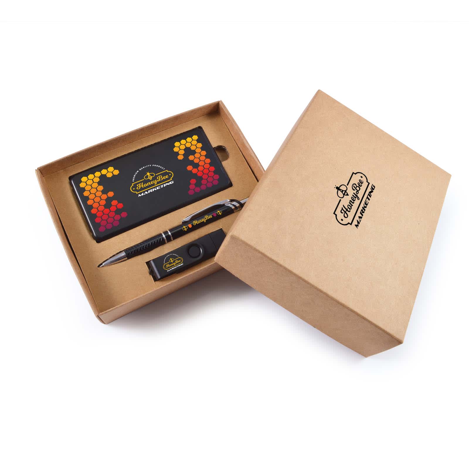 A cardboard gift set featuring a power bank, pen, and card holder in black and colorful accents. Includes branded packaging.