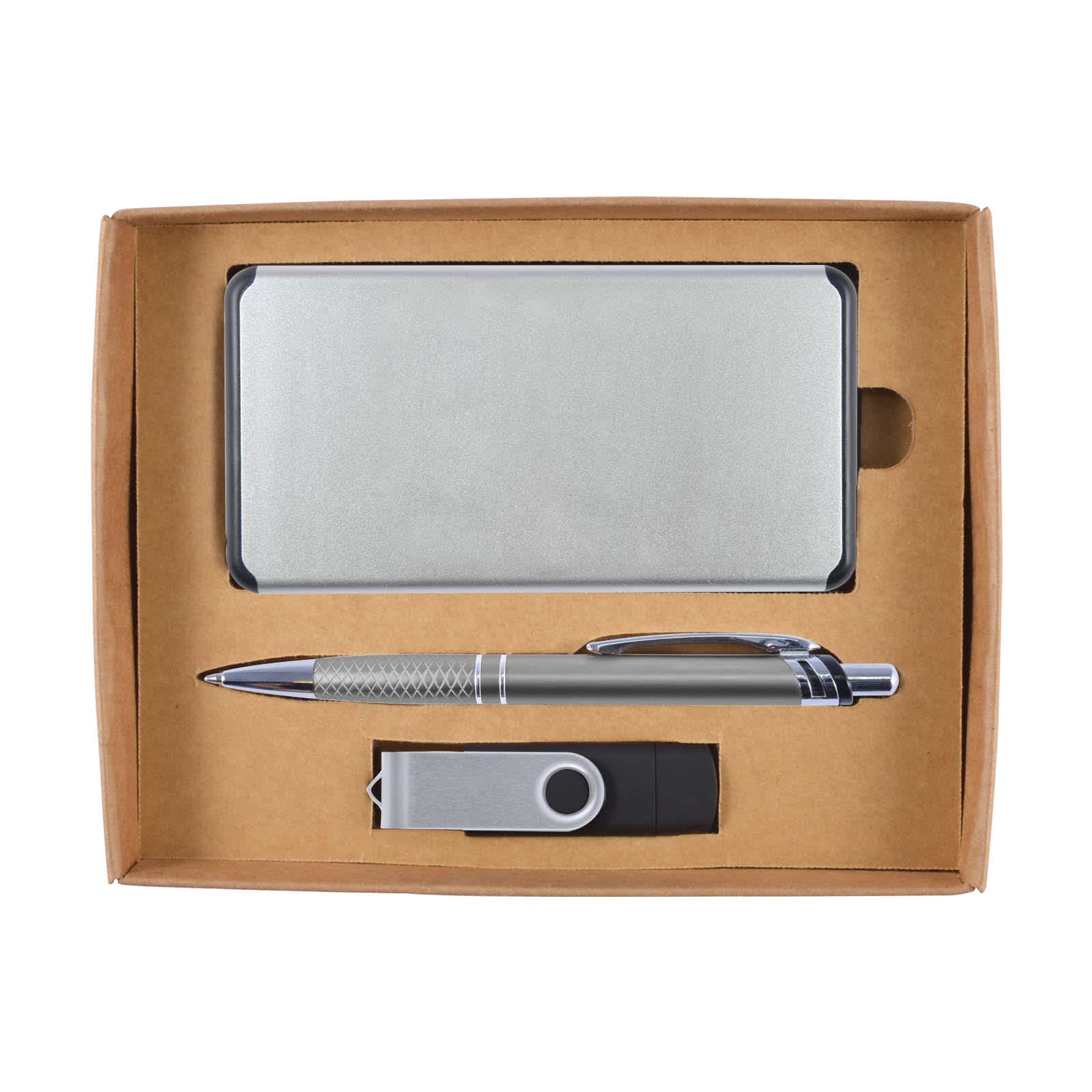 A gift set featuring a silver power bank, a silver pen, and a grey USB flash drive in a cardboard box.