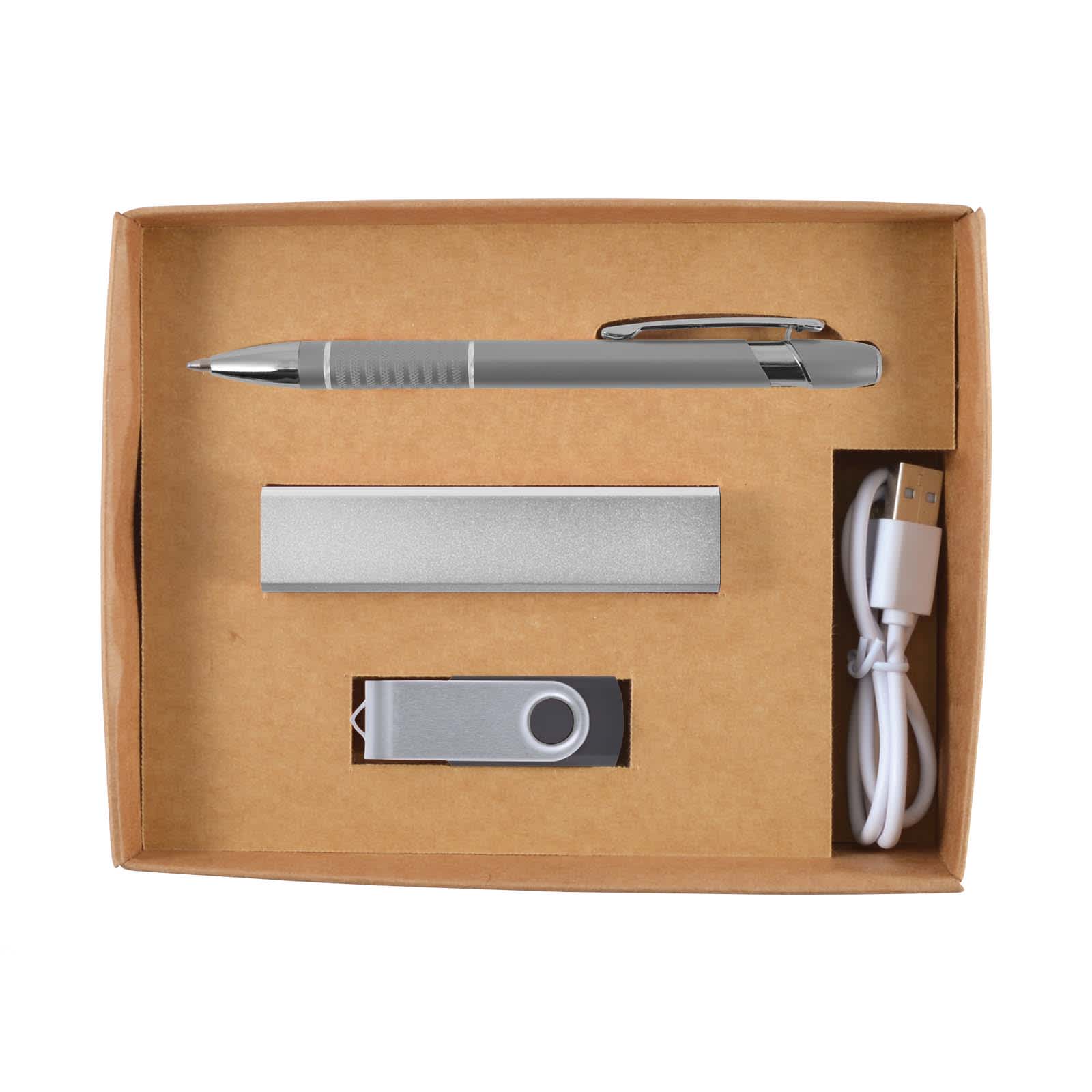 A cardboard gift box containing a silver pen, a power bank, a USB flash drive, and a charging cable.
