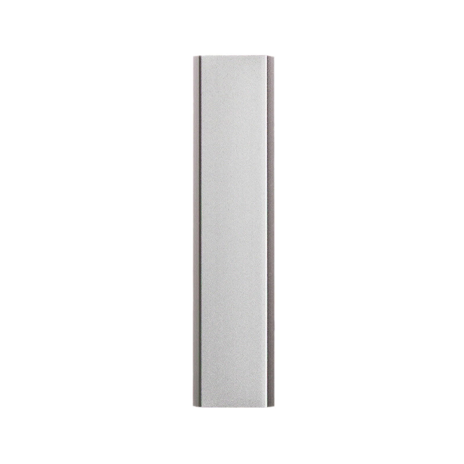 A sleek silver power bank, labeled 