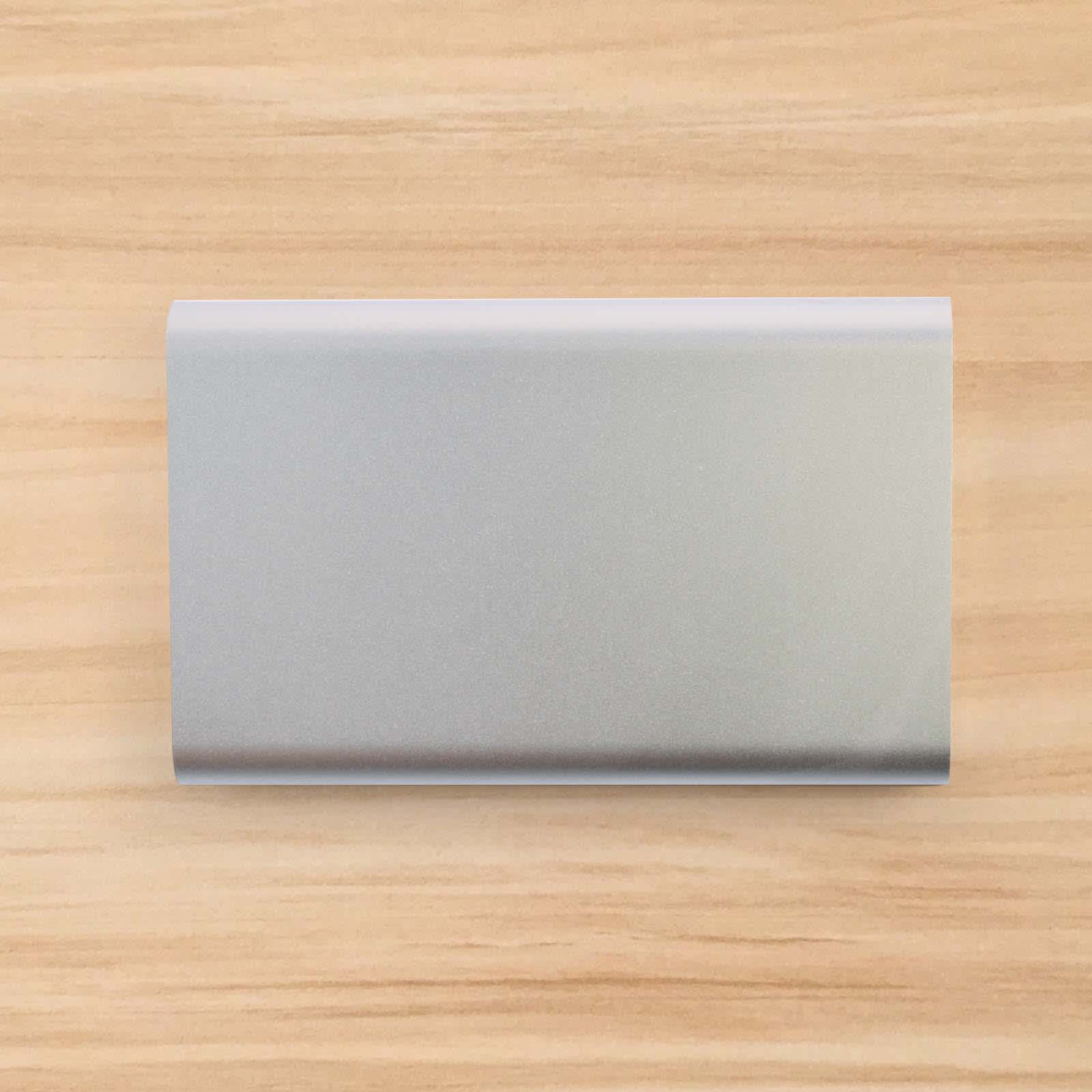 A sleek silver power bank with an 8,000mAh capacity.