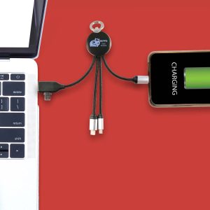 A charging cable with three connectors, featuring a round design and black colour, attached to a laptop and phone.