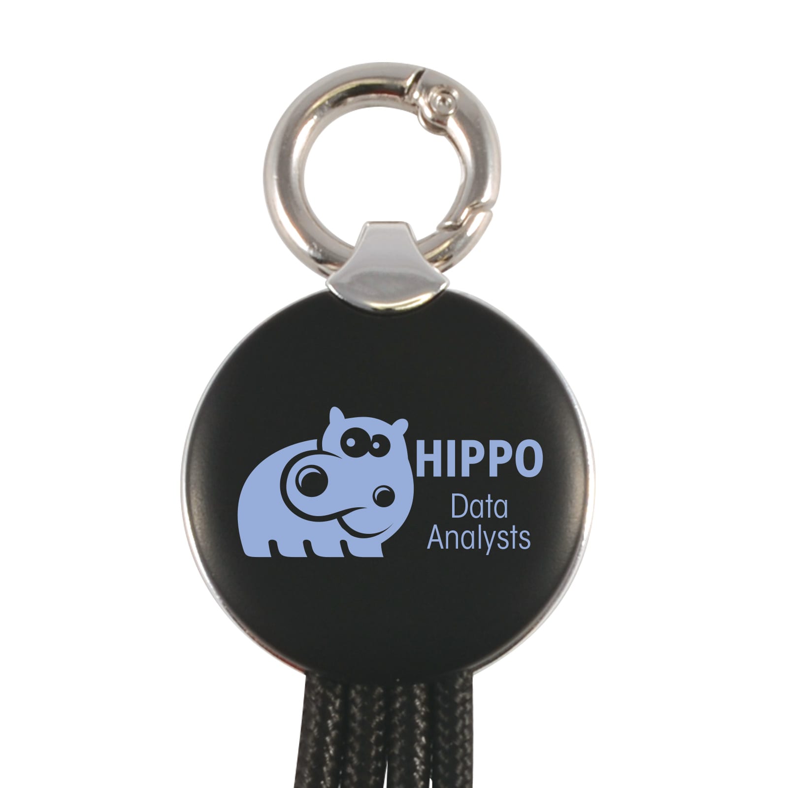 A round black keychain with a silver keyring, featuring a blue hippo design and the text 