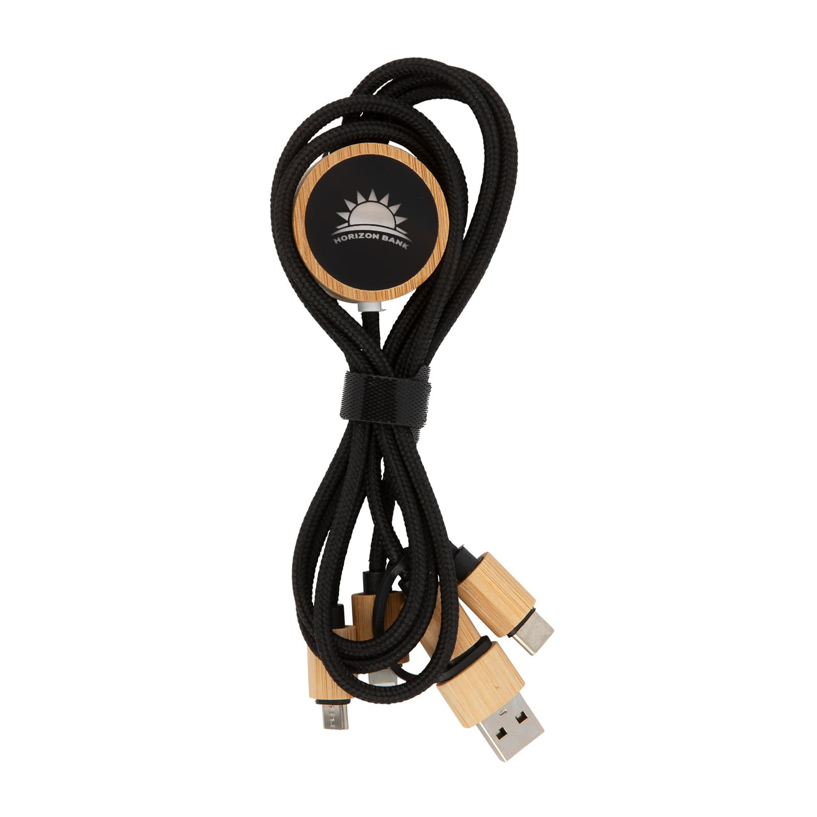 A charging cable with a braided black exterior and wooden connectors, coiled neatly with a circular logo.