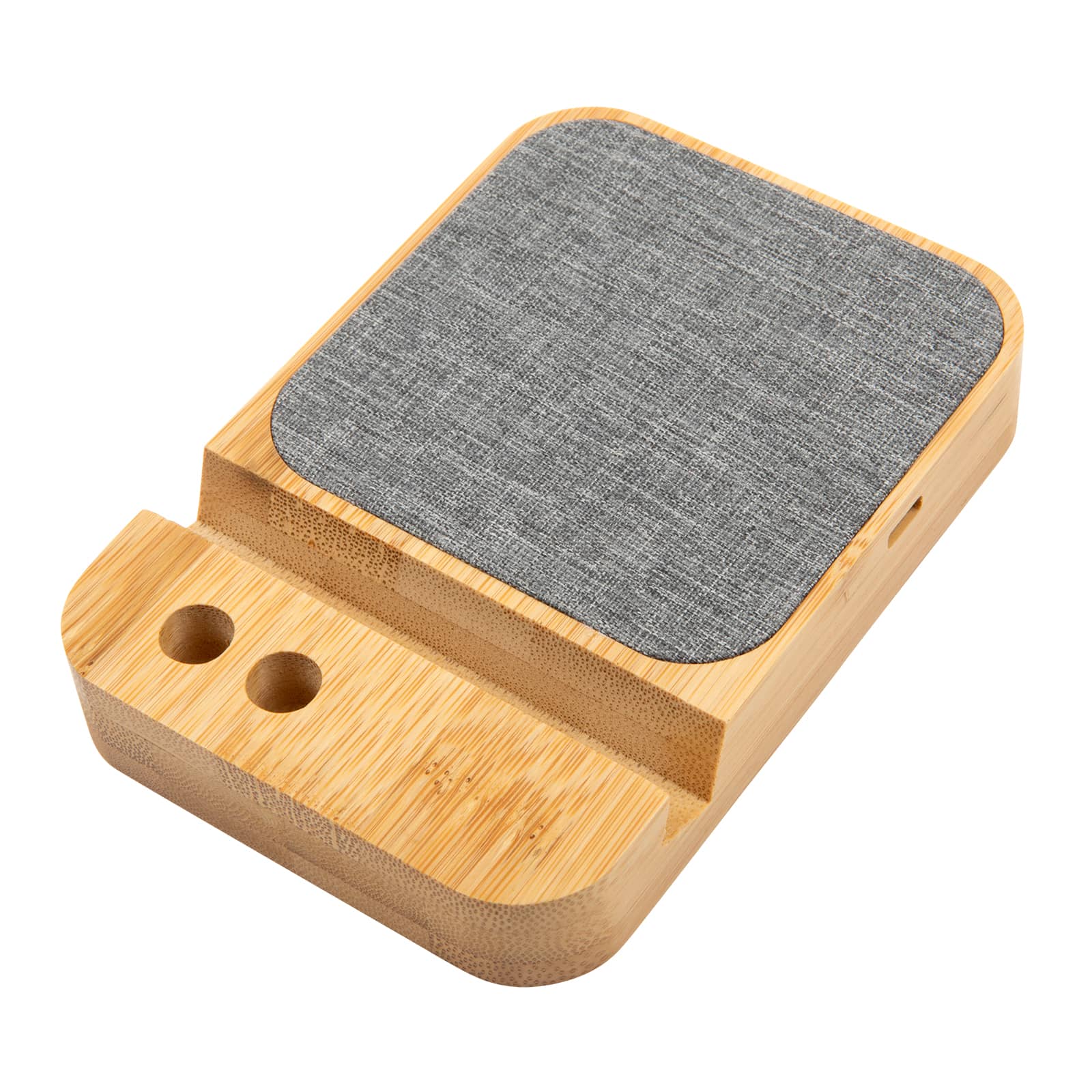 A bamboo charger with a gray fabric top and two cable slots, designed for charging devices.