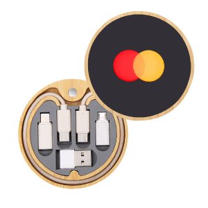 A circular wooden charger set with red and yellow circles, containing various charging cables and adapters.