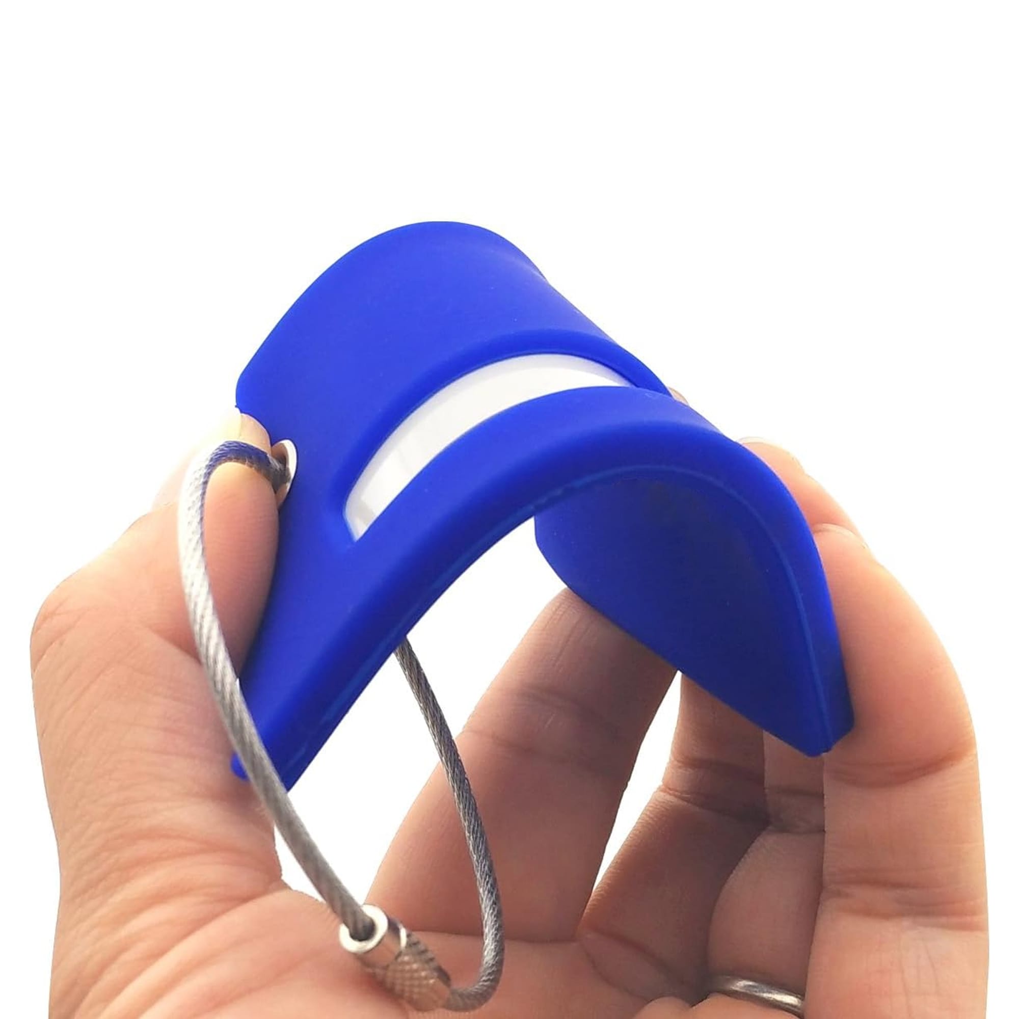 A blue silicone luggage tag held in a hand, featuring a loop for attachment and a smooth surface.