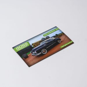 A rectangular fridge magnet featuring a classic black car with a green logo and an Australian Made badge.