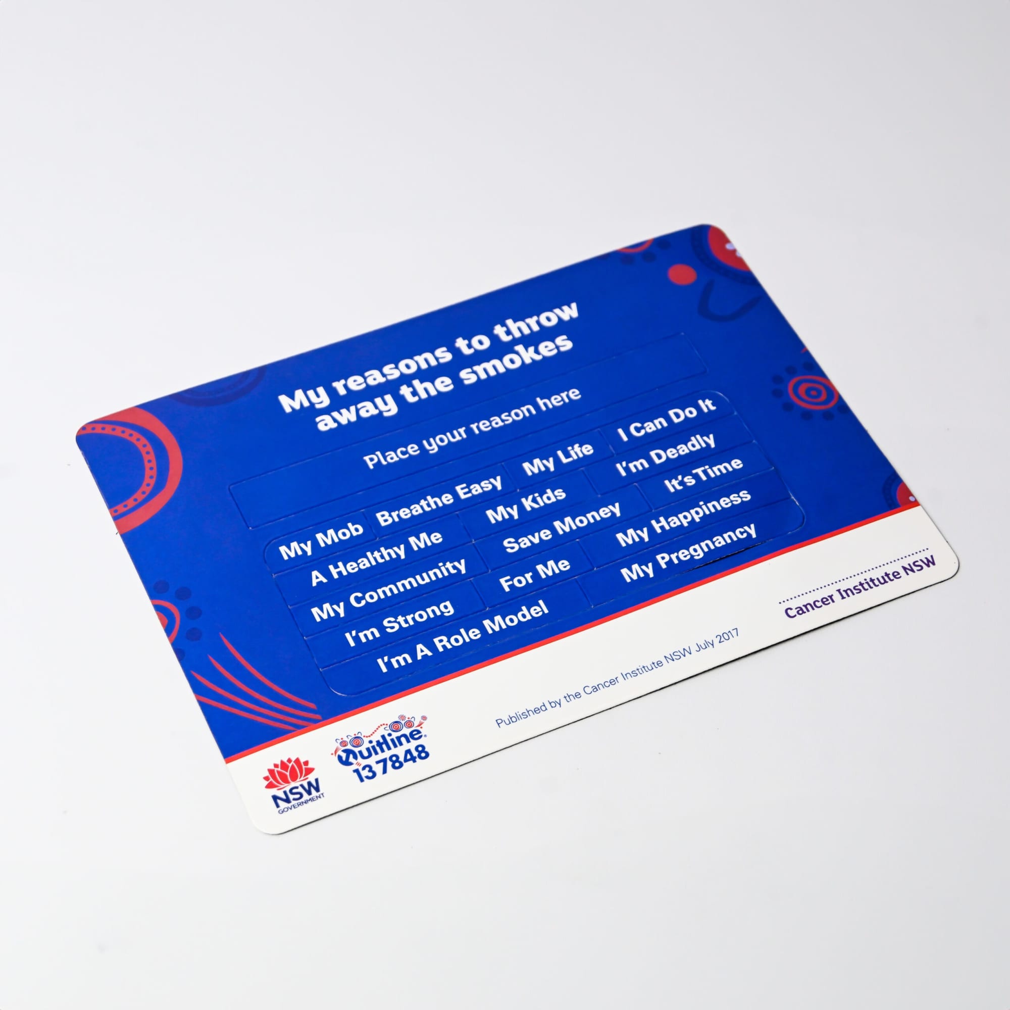 A colourful promotional card with various reasons to quit smoking, featuring bold text in blue and red, and a logo at the bottom.