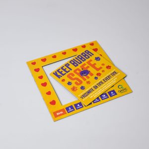 A yellow mini magnetic photo frame with a playful design and a branding logo in the corner.