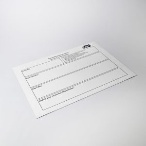 A magnetic whiteboard in white with a logo, featuring sections for notes and recommendations.