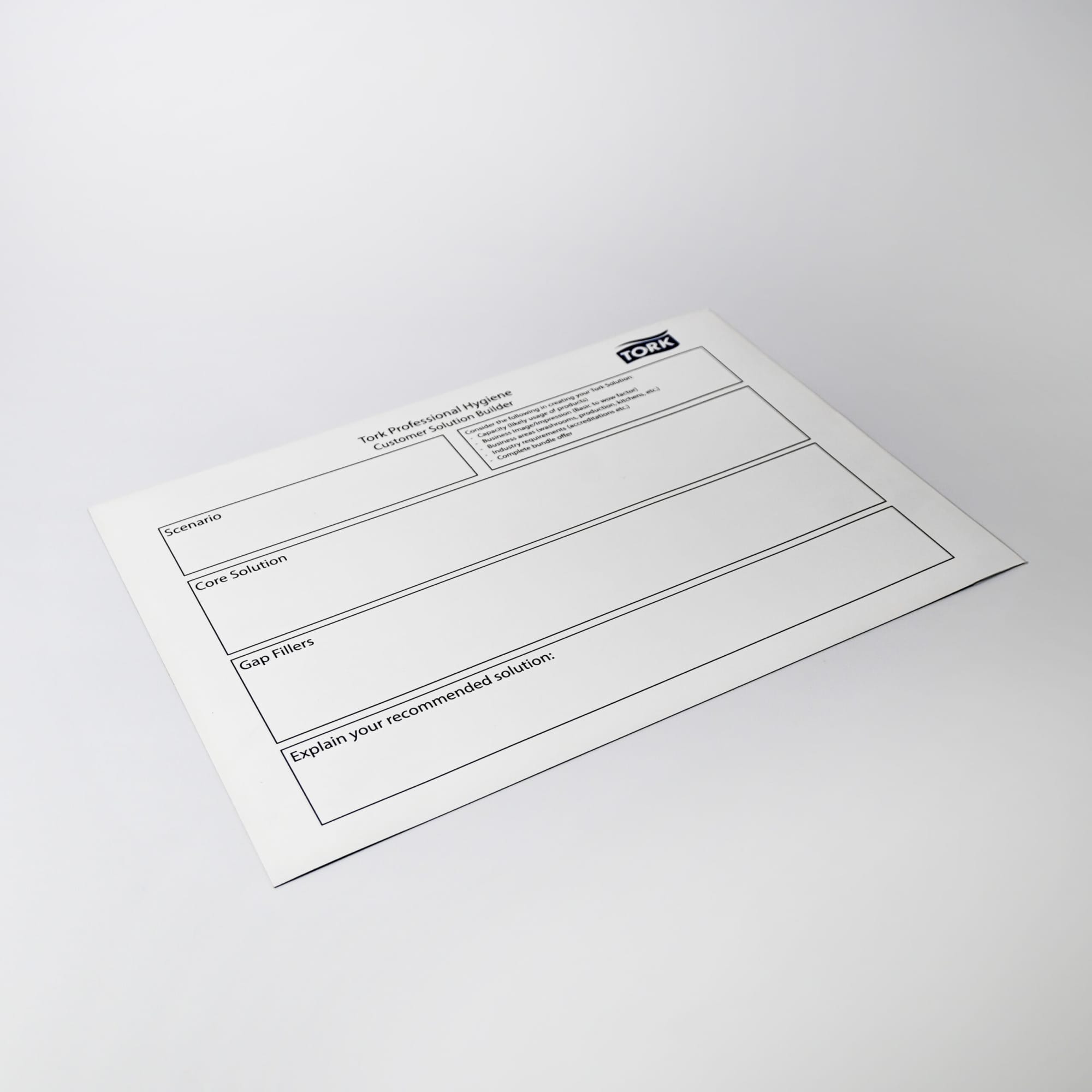A magnetic whiteboard in white with a logo, featuring sections for notes and recommendations.