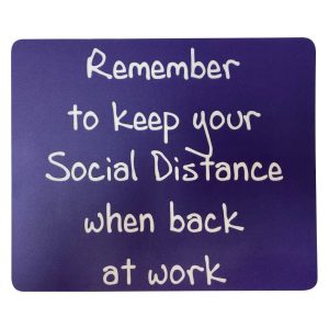 A purple mouse mat featuring a message about social distancing, with a logo indicating it is Australian made.