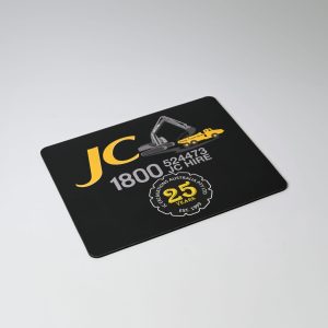 A black mouse mat featuring yellow graphics and text, including a logo and contact information.