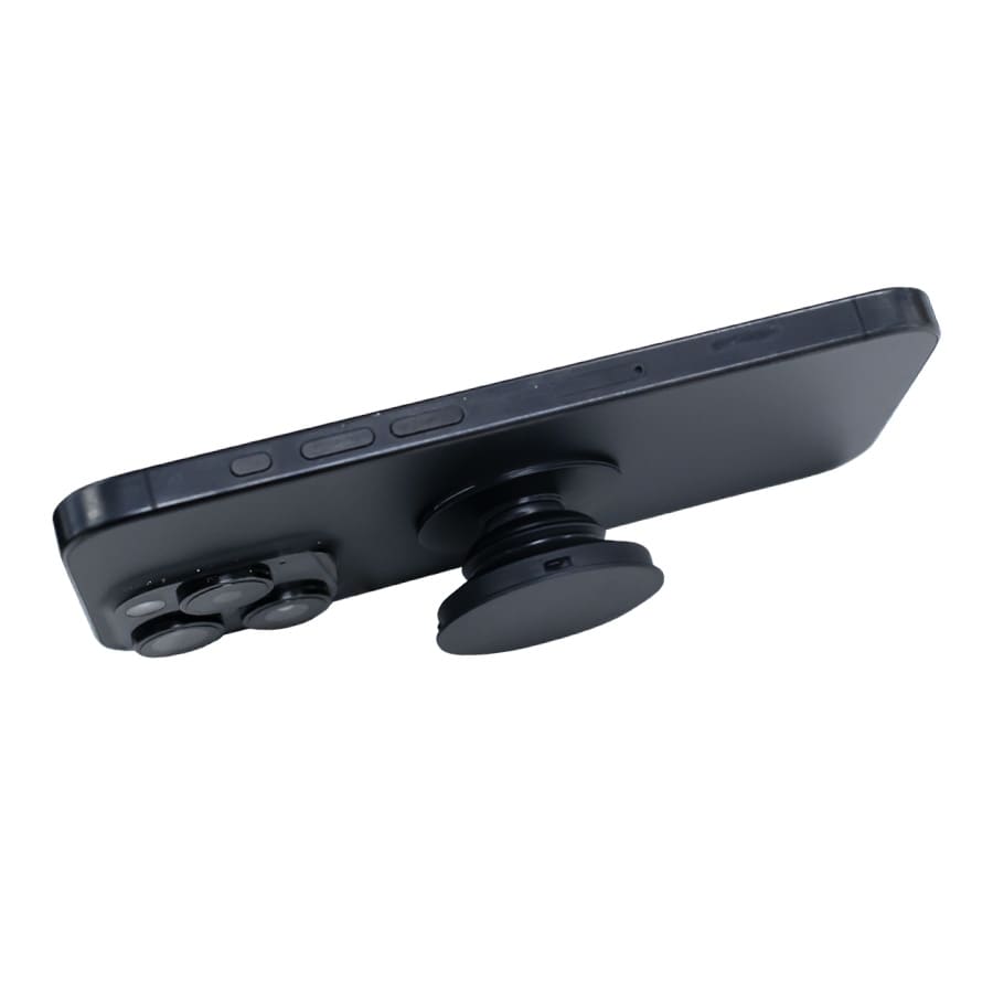 A black phone with a circular phone grip attached, featuring additional buttons for enhanced functionality.