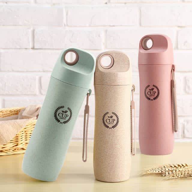 A drink bottle set featuring three colours: green, beige, and pink, with a logo and a side clip for convenience.
