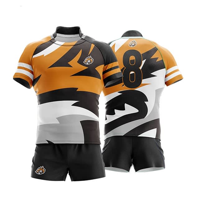 A rugby jersey in orange, black, and grey with a stylised design and an 