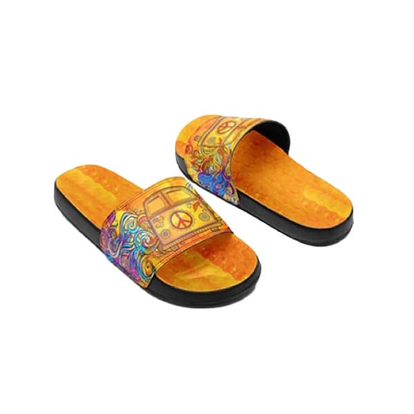 Brightly coloured slides featuring a vibrant orange design with peace signs and a graphic of a van. Black sole accents.