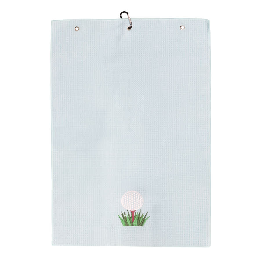 A light blue golf towel featuring a golf ball and grass design at the bottom, with a clip at the top.