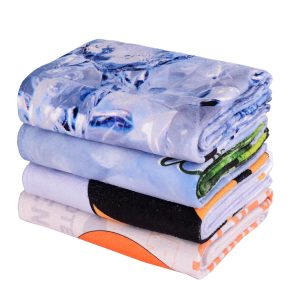 A stack of four face washers in various colours, featuring different patterns and a logo on one of the towels.